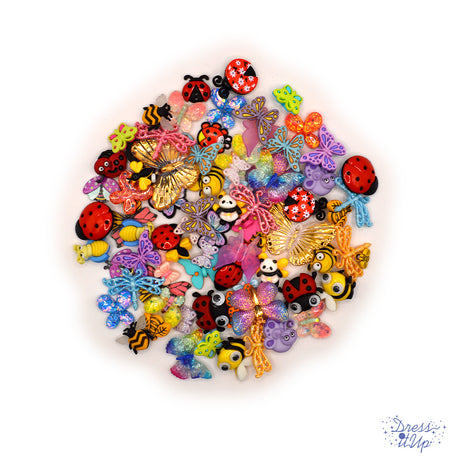 assortment of big and butterfly themed crafting embellishments