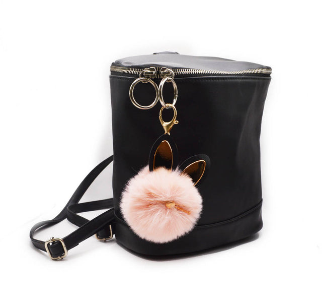 Dress up a back pack with a fuzzy pink cat