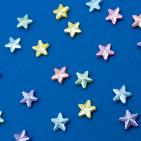 Shimmery plastic star beads for crafting