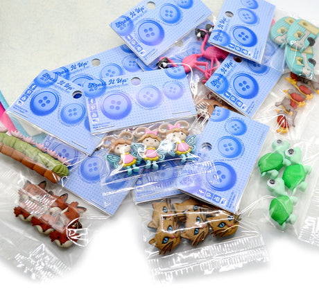 Surprise assortment of 100 button packs, single-style buttons and embellishments