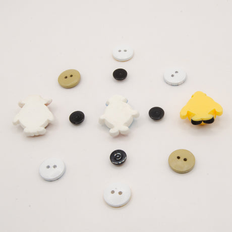 flat-back and sew-thru craft buttons in boy donut themes. fireman, police, and cowboy