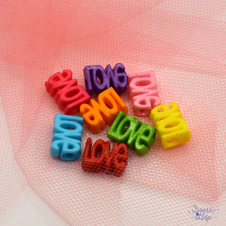 LOVE-shaped beads in vibrant colors for jewelry and crafting