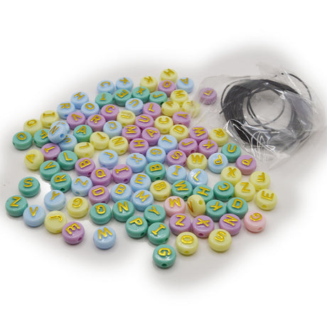 Letter beads in green, yellow, purple, and pink colors with gold lettering.