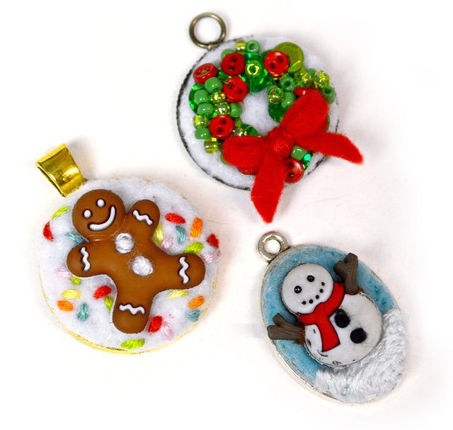 Oval and round pendant bases using winter and holiday button embellishments