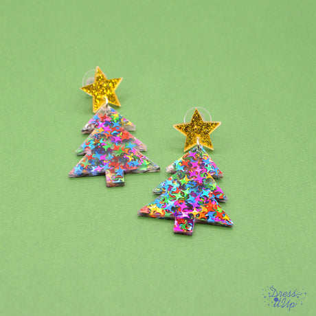 Made from lightweight resin, each earring showcases a glittering confetti Christmas tree topped with a sparkling star