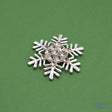 Sparkling rhinestones and enamel detailing add to holiday crafts and jewelry projects