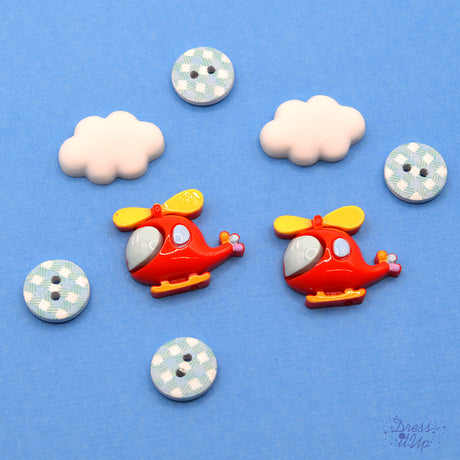 Two red helicopters, clouds and patterned buttons in blue