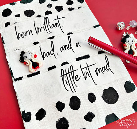 Cruella De Vil from Disney's 101 Dalmations used to embellish a notebook