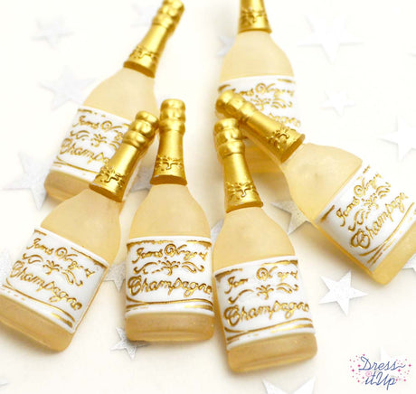 Gold champagne bottles add to wedding and anniversary projects