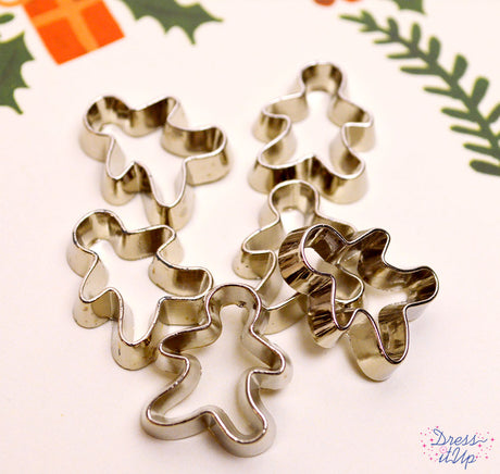 Tiny cookie cutters shaped like gingerbread men add to holiday, baking and kitchen crafts