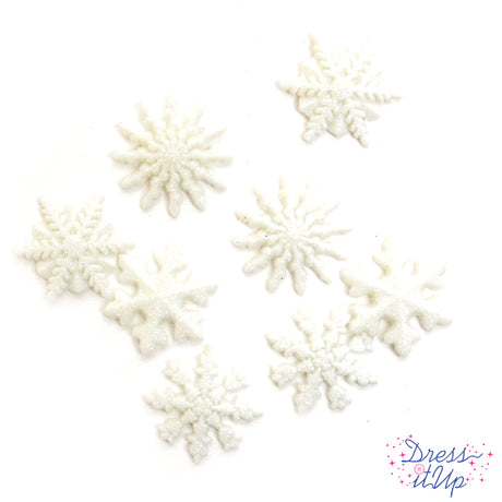 Eight glitter white snowflake loop back buttons for winter crafting and sewing projects