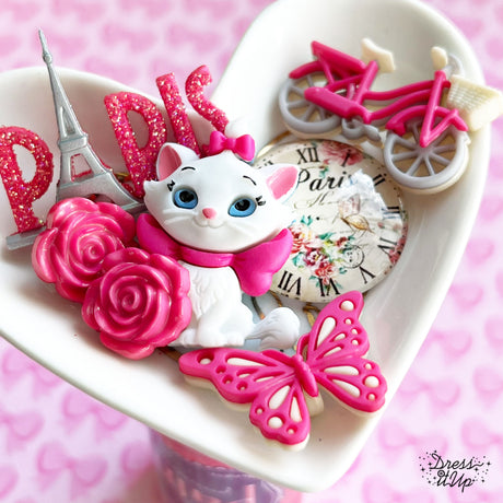 Marie from Disney's movie The Aristocats is all dressed in pink ready for Paris