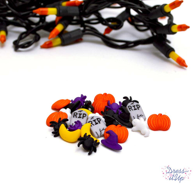 Mini Halloween embellishments witch's hats, ghosts, spooky skeletons, stars, crescent moons, bats, and tomb stones