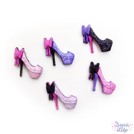 Glittery pink and purple high heel shoes embellish crafts and projects