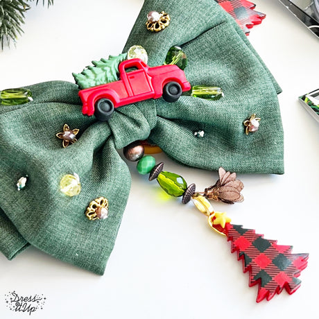 Green hair bow dressed up with Home For The Holidays button embellishments