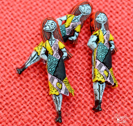 Sally from Disney's The Nightmare Before Christmas adds a sweet and spooky touch to projects