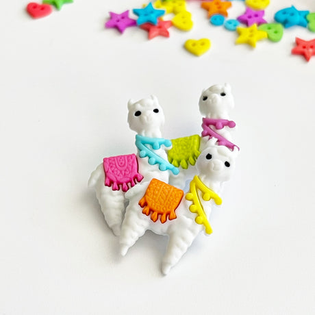 This embellishment pack features fluffy llamas decorated with colorful blankets