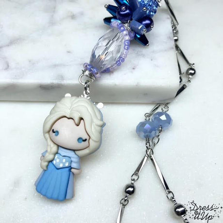 Princess Elsa from Disney's movie Frozen adds to this shiny necklace